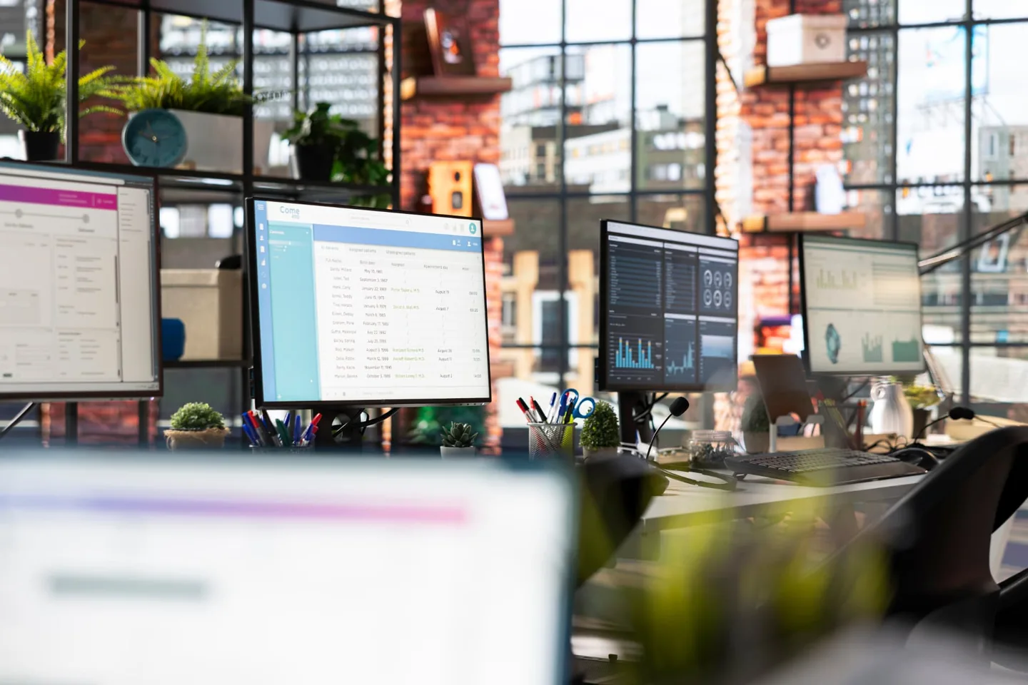 A modern product workspace with multiple screens